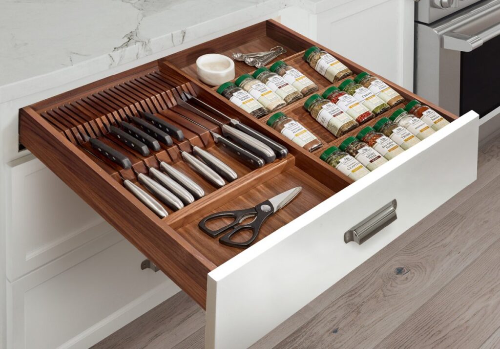 Wooden double knife block and spice rack insert installed into custom kitchen drawer