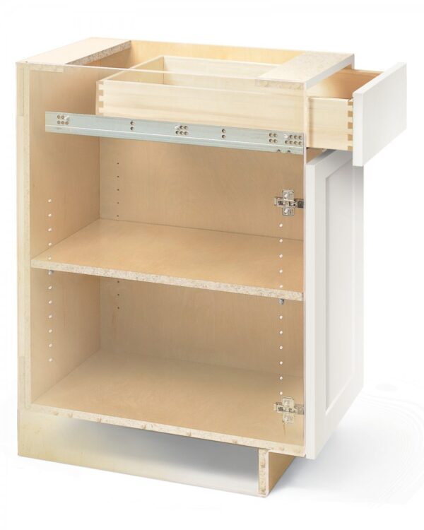 Cabinet with plastic sidewall to showcase the anatomy of a fully installed cabinet, including sliding drawer on top and hinged door on bottom.