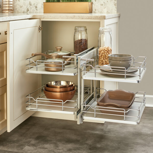 Blind corner pullout with two shelves, featuring metal railing on each shelf.