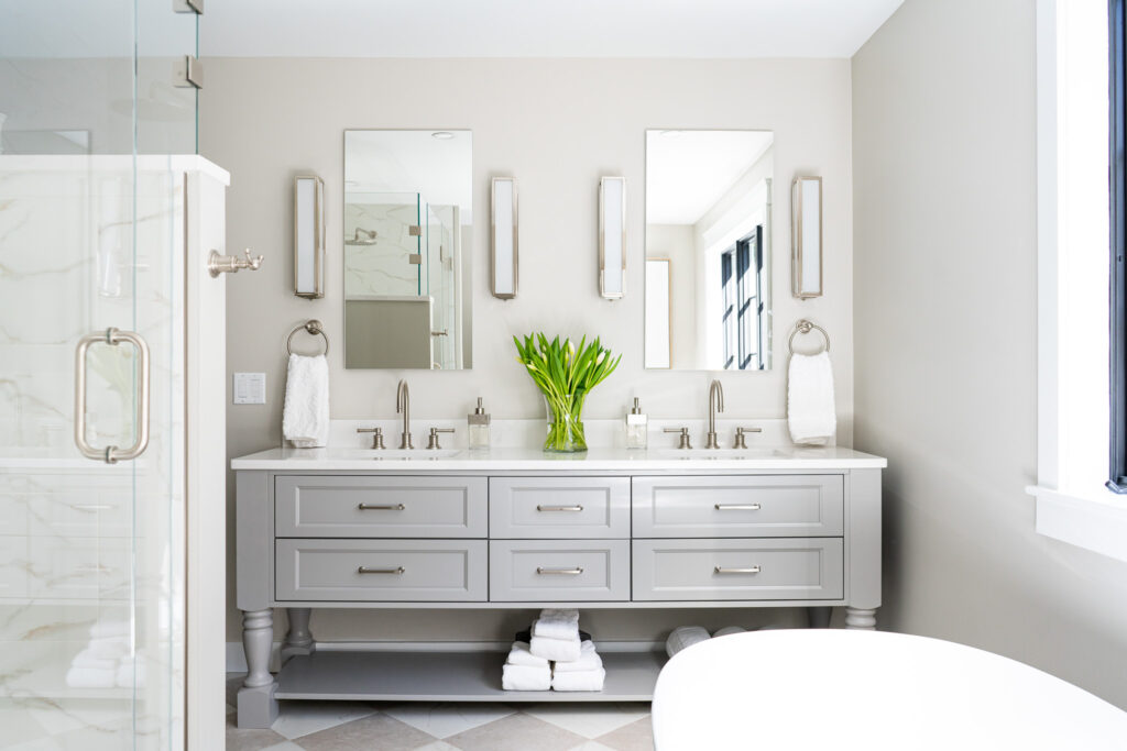 Bathroom vanity featuring a Manhattan door style. The vanity is made of maple wood finished in the shade willow.