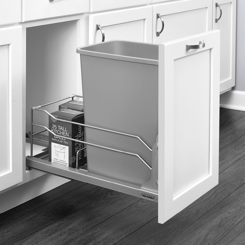 Pull out drawer with power coated metal undermount featuring wire frame railing around the base.