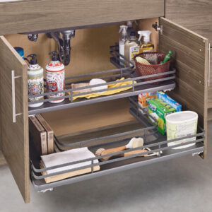 Undersink pullout drawers made of metal with metal railing. Drawers are cut into U shape so they can fit around kitchen sink piping