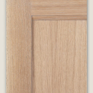 Sample cut of white oak door stained with natural light wash stain