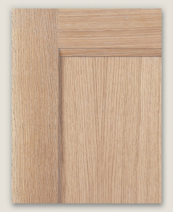 Sample cut of white oak door stained with natural light wash stain