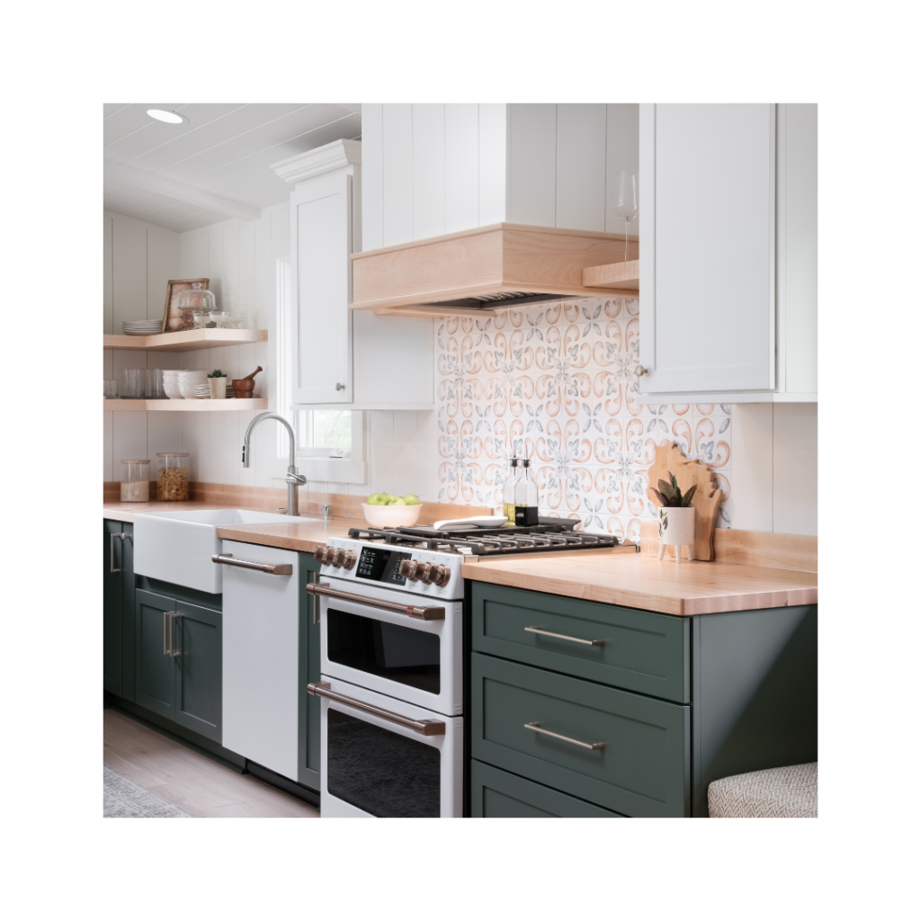 Custom kitchen cabinetry made with painted maple in the colors alabaster and custom green